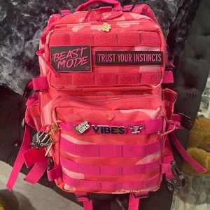 Pink wolfpak camo 25L